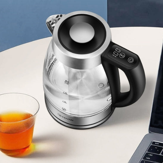 bouilloire electrique table blanche verre thé ordinateur fond bleu