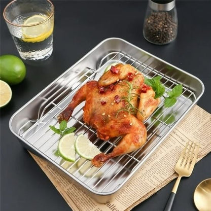 plaque de cuisson poulet lime citron poivre journal fourchette comptoir noir