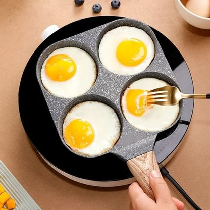 poele a oeuf oeuf fourchette bleuets plaque chauffante